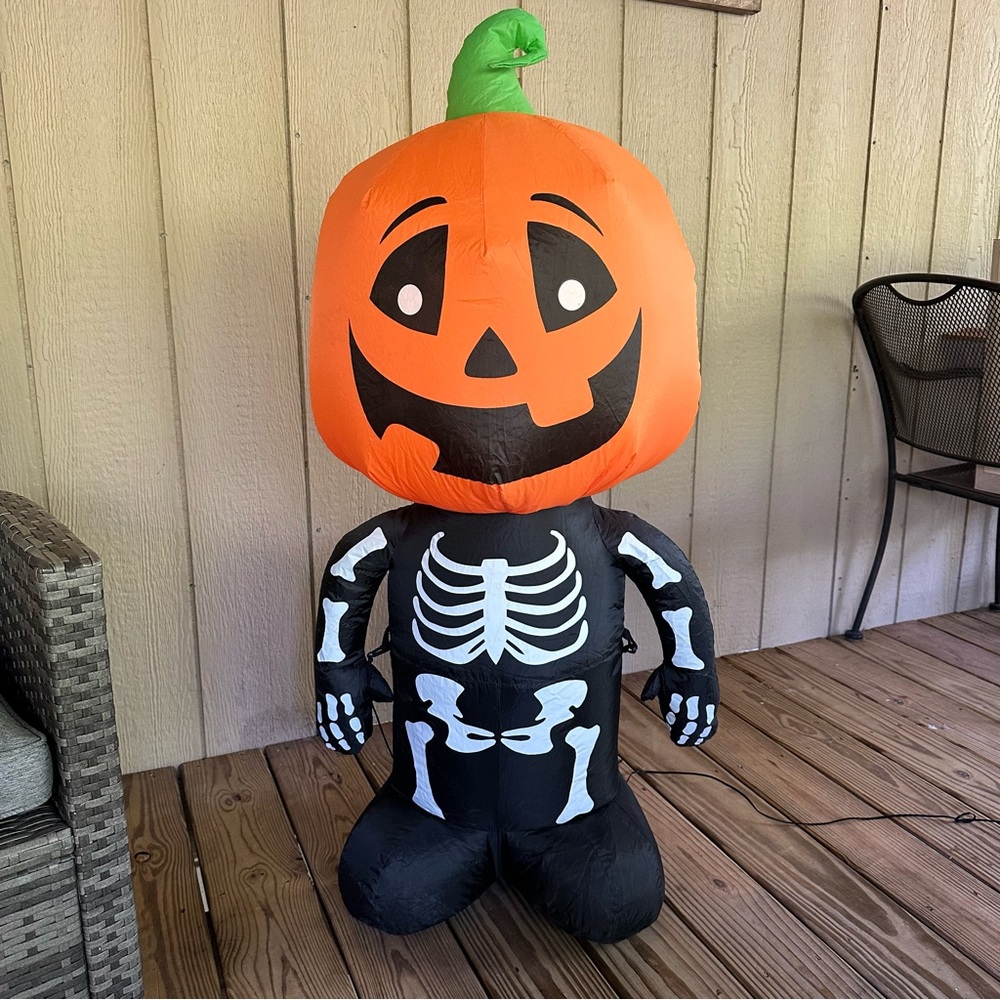 Home Accents Holiday 3.5 ft. Pre-lit Inflatable Happy Pumpkin Boy Skeleton LED